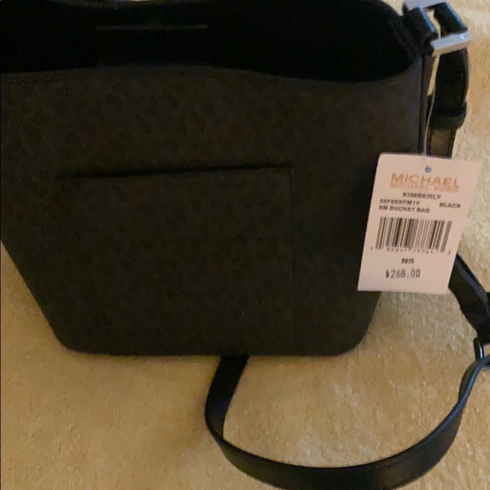 One Michael Kors crossbody bag new with tag